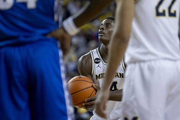Moussa Diabate (14) and Caleb Houstan (22)