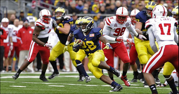 Mark Huyge (72), Fitzgerald Toussaint (28), and Taylor Lewan (77)