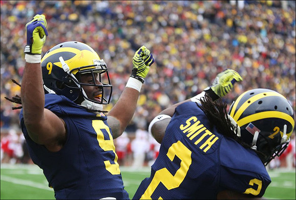 Martavious Odoms (9) and Vincent Smith (2)