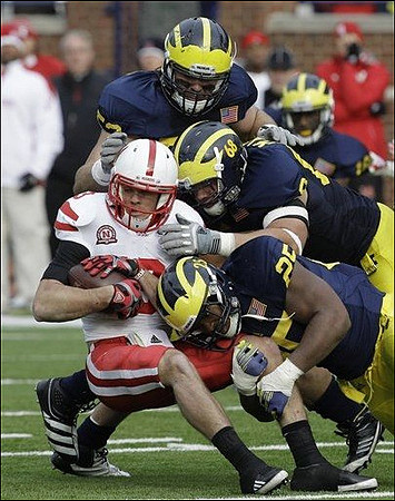 Kenny Demens (25), Mike Martin (68), Ryan Van Bergen (53), and Blake Countess (18)
