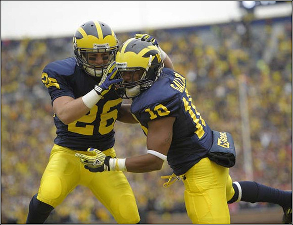 Drew Dileo (26) and Jeremy Gallon (10)