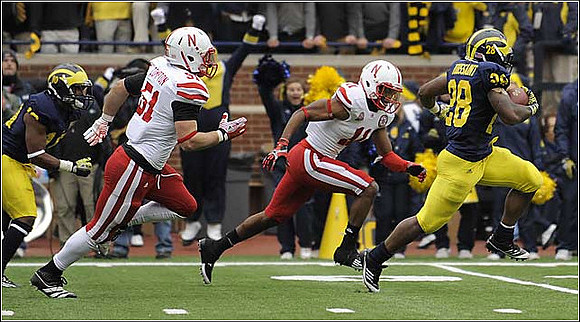 Jeremy Gallon (10) and Fitzgerald Toussaint (28)