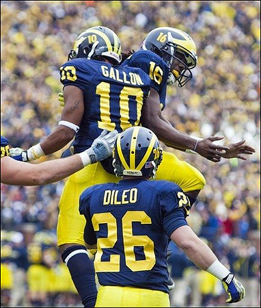 Drew Dileo (26), Jeremy Gallon (10), and Denard Robinson (16)