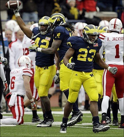 J.B. Fitzgerald (42), Josh Furman (14), and Floyd Simmons (23)