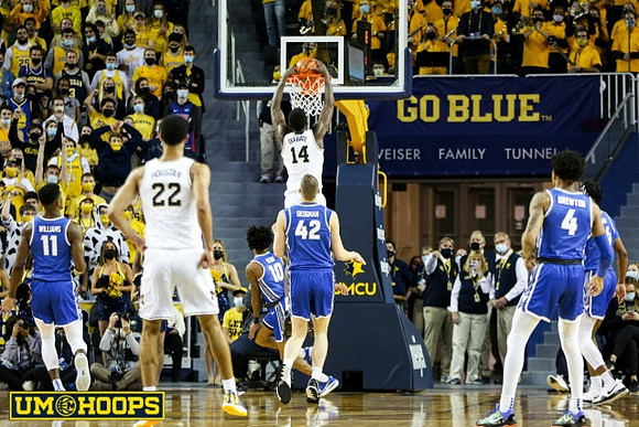 Caleb Houstan (22) and Moussa Diabate (14)