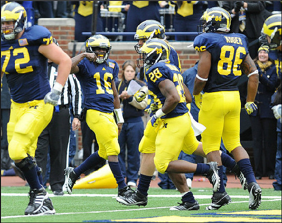Mark Huyge (72), Denard Robinson (16), Fitzgerald Toussaint (28), Steve Watson (84), and Kevin Koger (86)