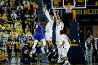 Terrance Williams II (5), Hunter Dickinson (1), and DeVante' Jones (12)