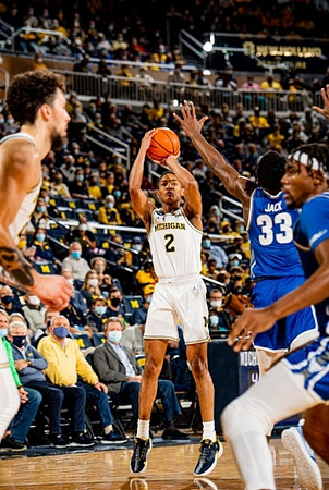 Brandon Johns Jr. (23) and Kobe Bufkin (2)
