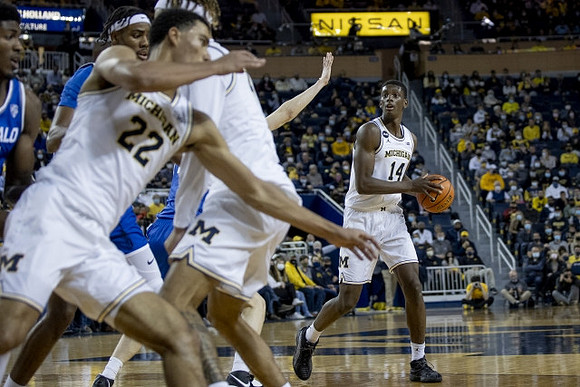 Caleb Houstan (22) and Moussa Diabate (14)