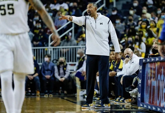 Juwan Howard and Phil Martelli