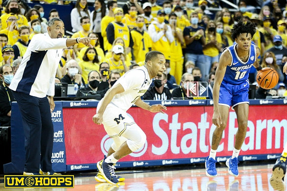 Juwan Howard and DeVante' Jones (12)