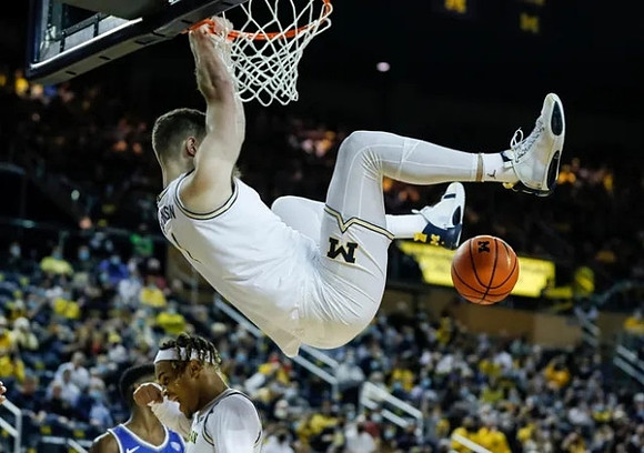 Terrance Williams II (5) and Hunter Dickinson (1)