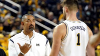 Juwan Howard and Hunter Dickinson (1)