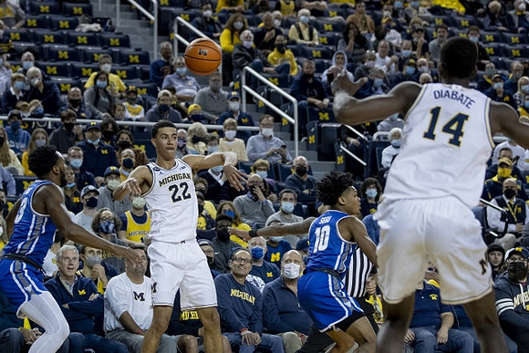 Caleb Houstan (22) and Moussa Diabate (14)