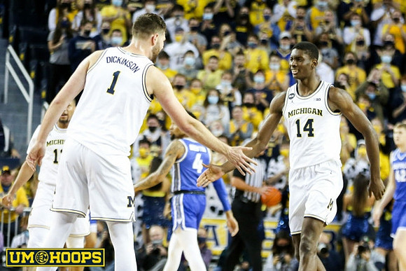 DeVante' Jones (12), Hunter Dickinson (1), and Moussa Diabate (14)