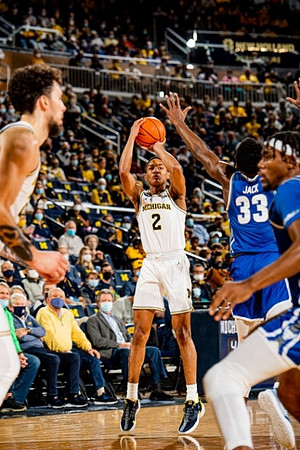 Brandon Johns Jr. (23) and Kobe Bufkin (2)