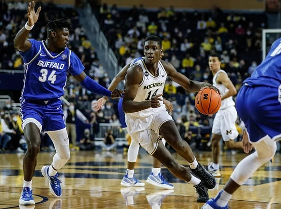 Moussa Diabate (14) and Caleb Houstan (22)
