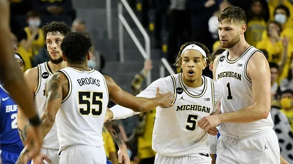 Brandon Johns Jr. (23), Eli Brooks (55), Terrance Williams II (5), and Hunter Dickinson (1)