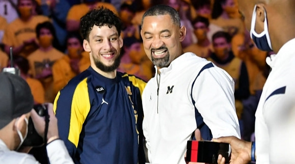 Brandon Johns Jr. (23) and Juwan Howard
