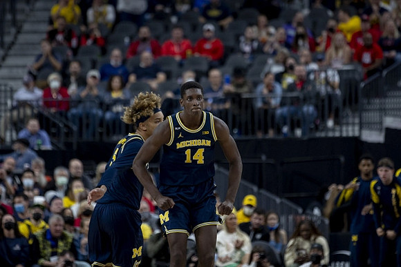 Terrance Williams II (5) and Moussa Diabate (14)
