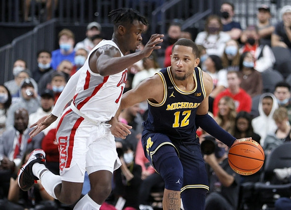 DeVante' Jones (12)