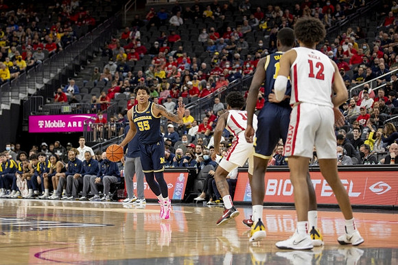 Eli Brooks (55) and Moussa Diabate (14)