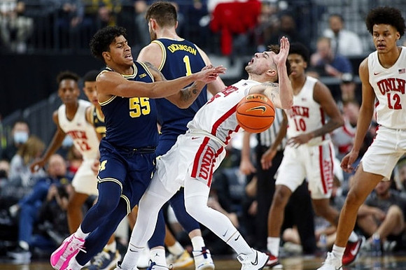 Eli Brooks (55) and Hunter Dickinson (1)