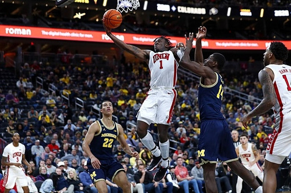 Caleb Houstan (22) and Moussa Diabate (14)