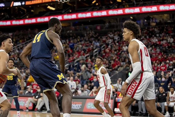 Eli Brooks (55) and Moussa Diabate (14)