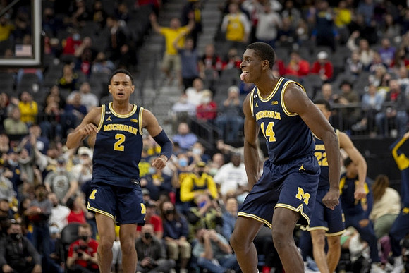 Kobe Bufkin (2), Moussa Diabate (14), and Caleb Houstan (22)