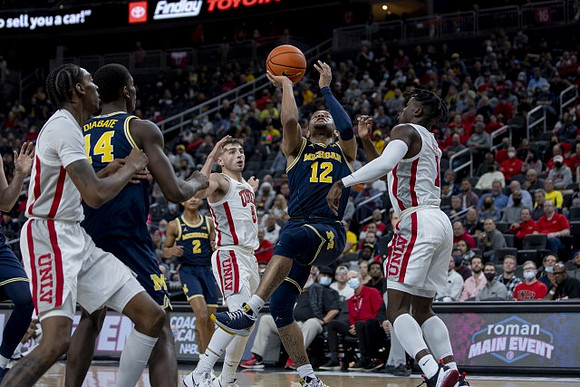 Moussa Diabate (14), Kobe Bufkin (2), and DeVante' Jones (12)