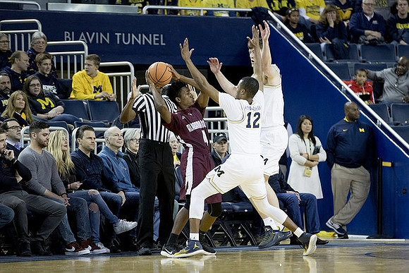 Muhammad-Ali Abdur-Rahkman (12) and Jon Teske (15)