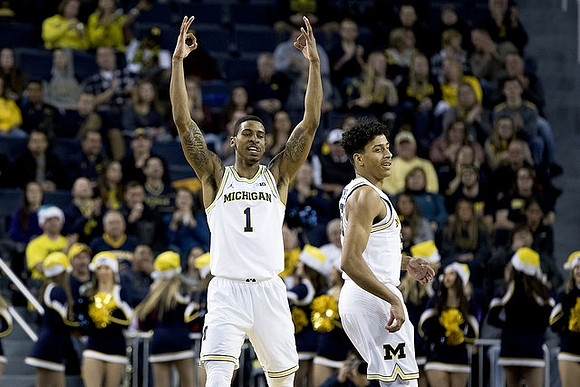 Charles Matthews (1) and Eli Brooks (55)