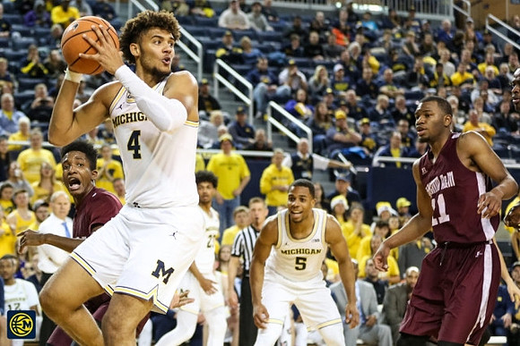 Isaiah Livers (4), Jaaron Simmons (5), and Ibi Watson (23)