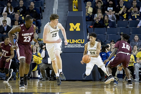 Jon Teske (15) and Eli Brooks (55)