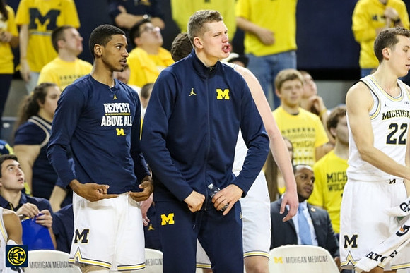 Charles Matthews (1), Moritz Wagner (13), and Duncan Robinson (22)