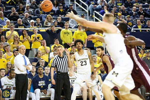 John Beilein, Ibi Watson (23), and Austin Davis (51)