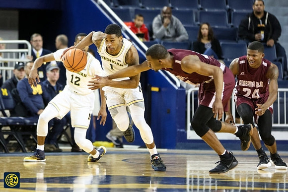 Muhammad-Ali Abdur-Rahkman (12) and Charles Matthews (1)