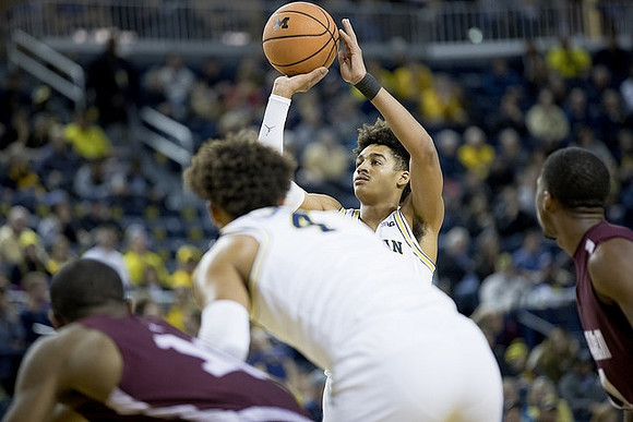 Isaiah Livers (4) and Jordan Poole (2)