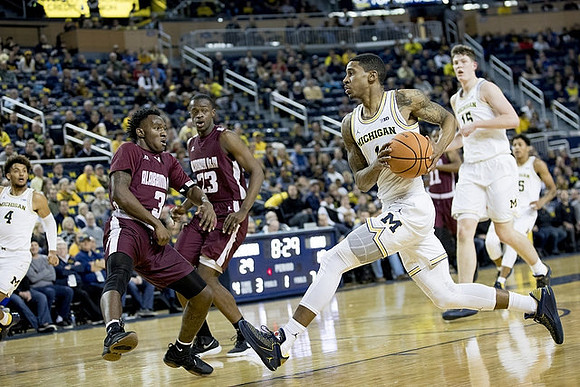 Isaiah Livers (4), Charles Matthews (1), Jon Teske (15), and Eli Brooks (55)
