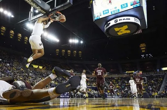 Isaiah Livers (4), Zavier Simpson (3), and Muhammad-Ali Abdur-Rahkman (12)