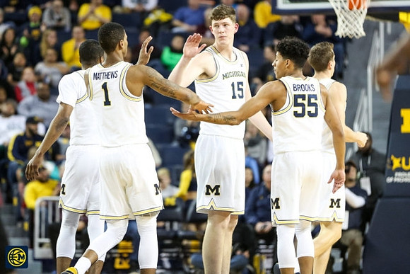 Charles Matthews (1), Muhammad-Ali Abdur-Rahkman (12), Jon Teske (15), Eli Brooks (55), and Duncan Robinson (22)