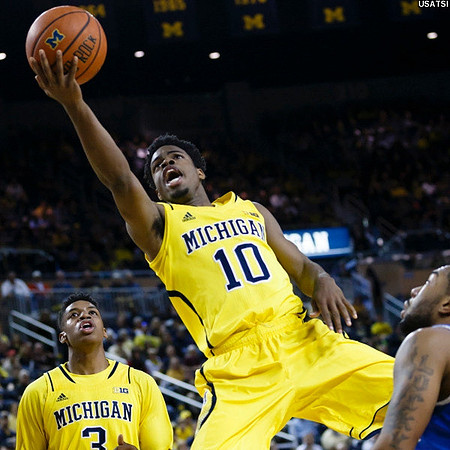 Kameron Chatman (3) and Derrick Walton Jr. (10)