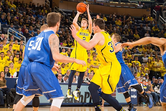 Spike Albrecht (2) and Ricky Doyle (32)