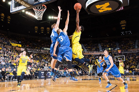 Ricky Doyle (32) and Derrick Walton Jr. (10)