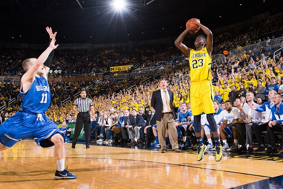 Caris LeVert (23) and Hillsdale Head Coach John Tharp