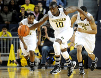 Eso Akunne (5), Tim Hardaway Jr. (10), and Trey Burke (3)