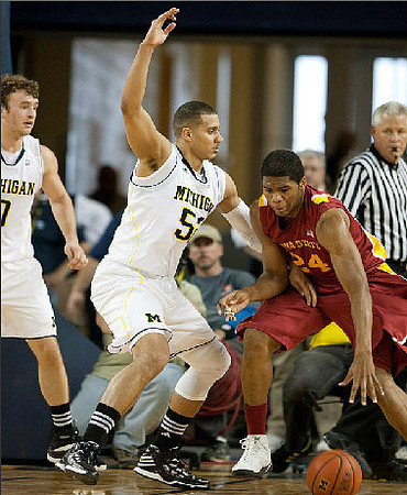 Zack Novak (0) and Jordan Morgan (52)