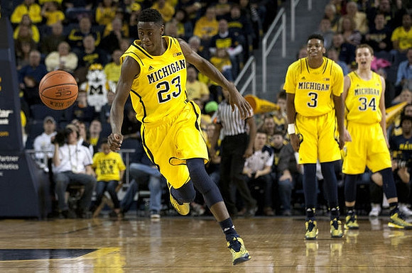 Caris LeVert (23), Kameron Chatman (3), and Mark Donnal (34)