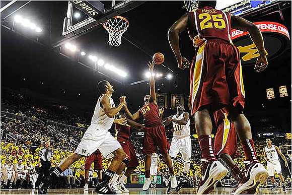 Jon Horford (15), Tim Hardaway Jr. (10), and Trey Burke (3)